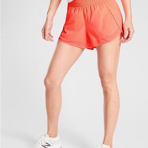 Mesh Racer Run Mid Rise 4 Short in Neon Coral Volt